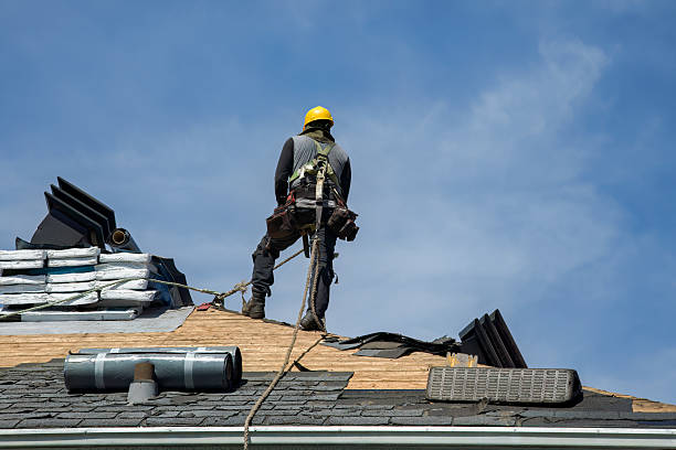Professional Roofing technician working in Concord, MO